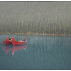 Pair of Canoes on a misty morning