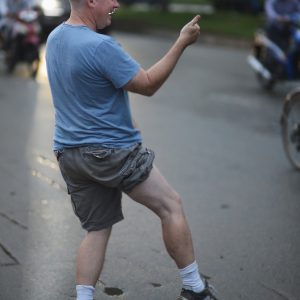 Photographs of White Man in Vietnam Exposing his Leg
